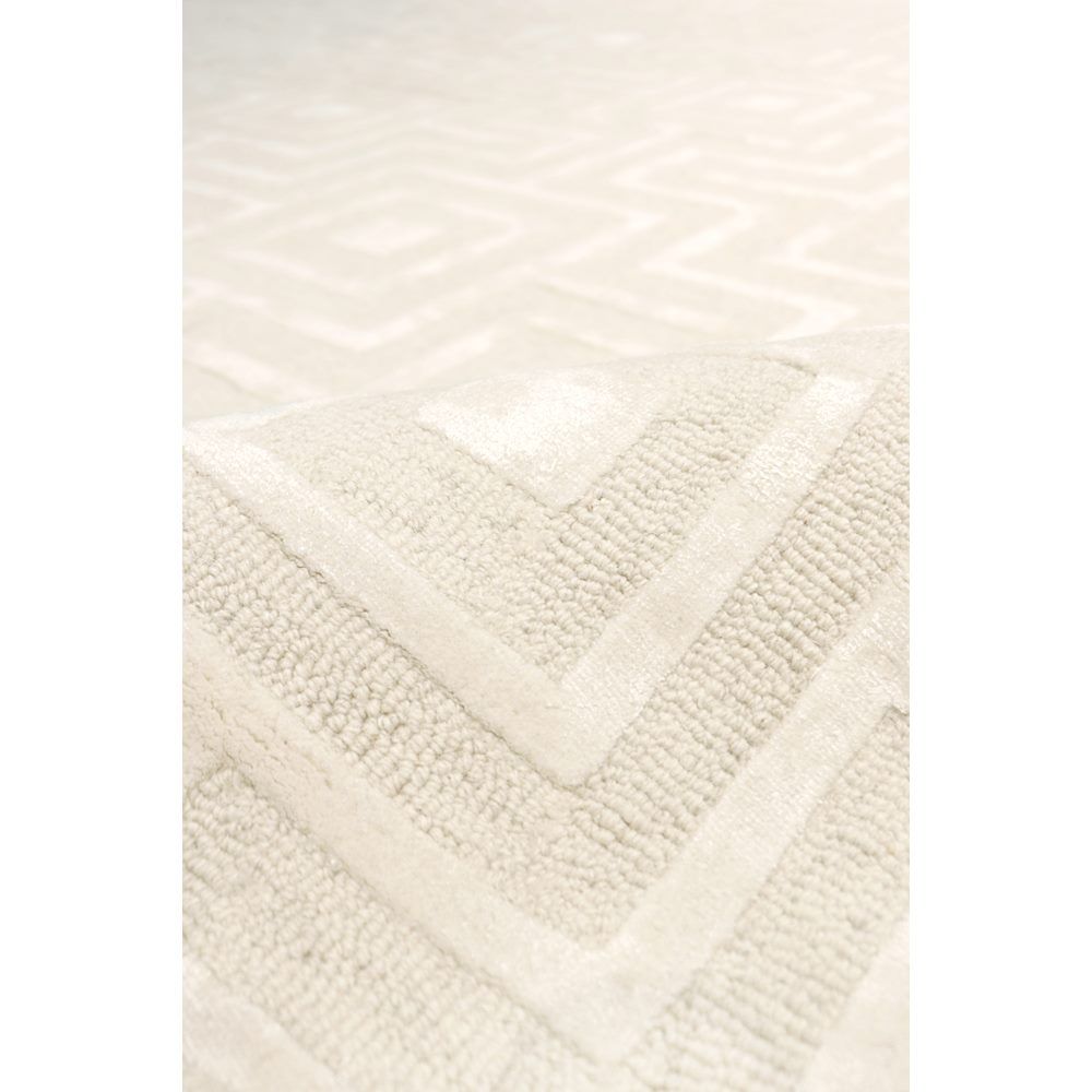 Edgy Hand-Tufted Ivory Area Rug